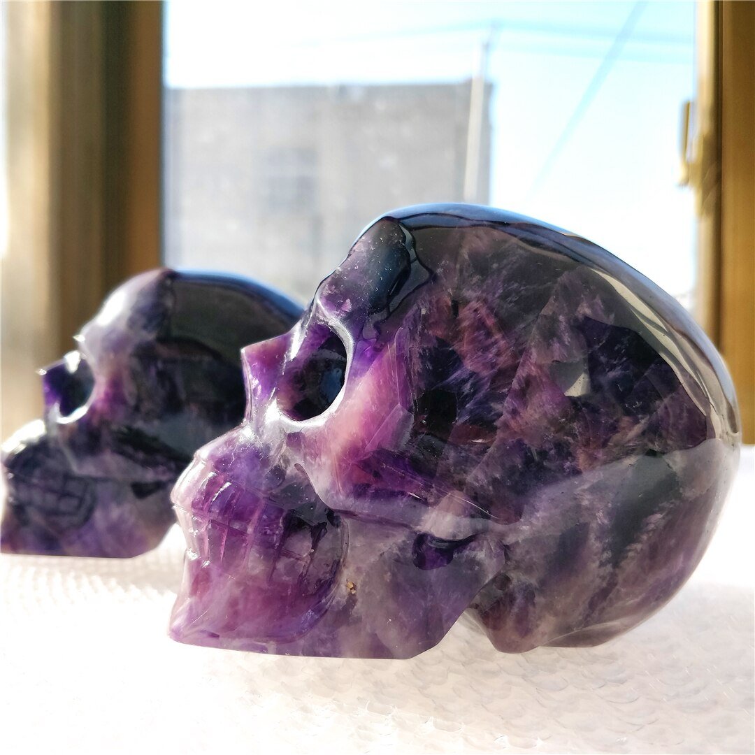Hand carved skull Amethyst Brazilian Dream
